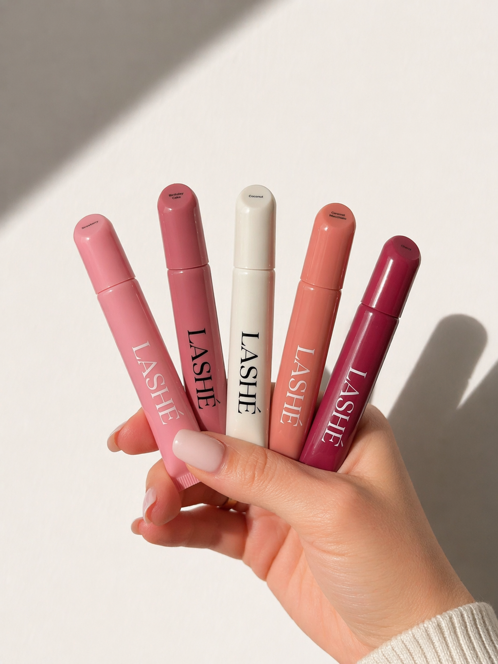 LASHÉ Peptide Lip Balm – Birthday Cake