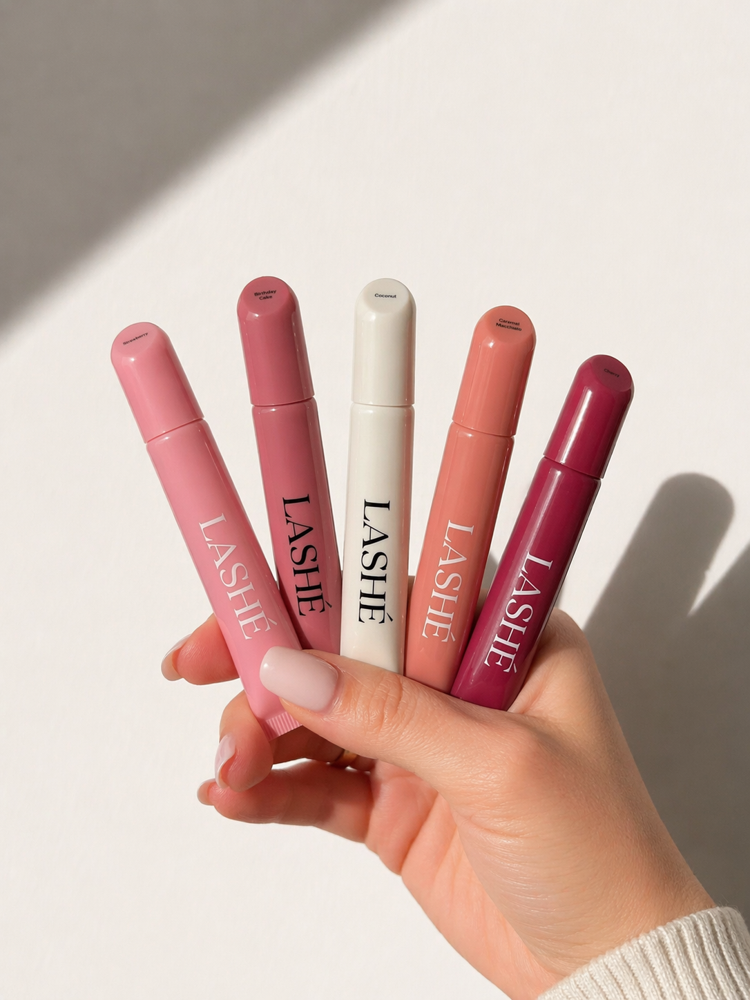 LASHÉ Peptide Lip Balm – Birthday Cake